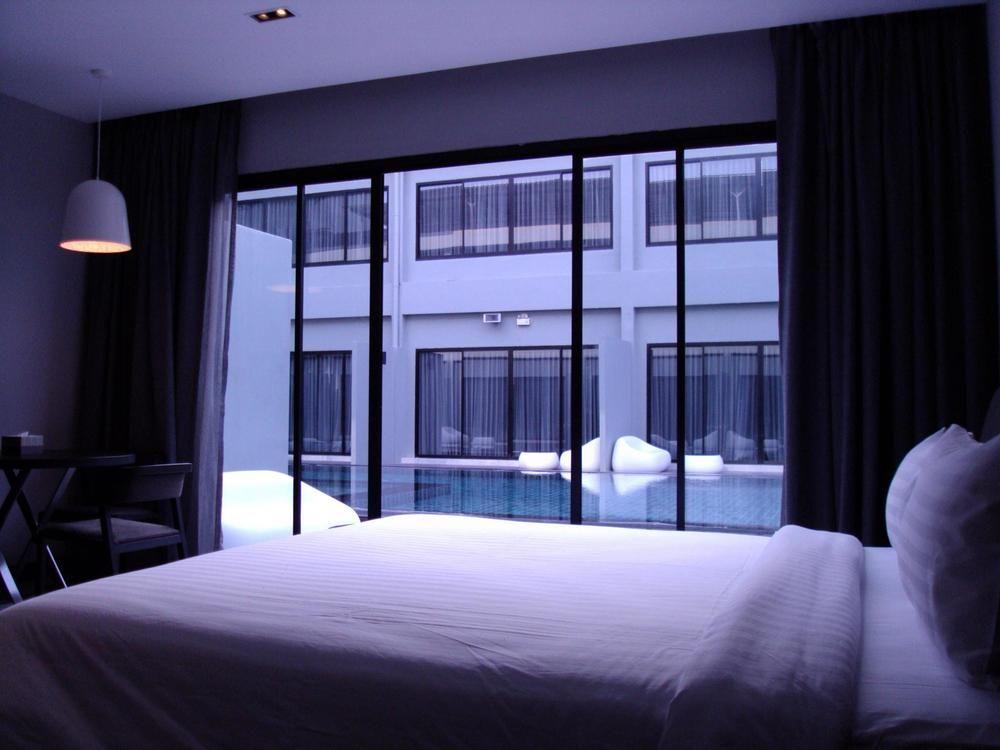 S Ratchada Leisure Hotel - Sha Plus Bangkok Eksteriør bilde A bedroom at the hotel